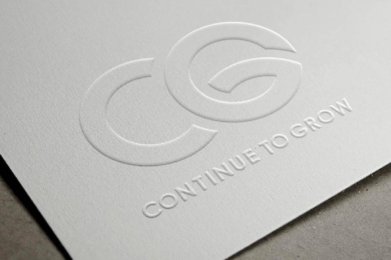Embossed logo finish on printed packaging