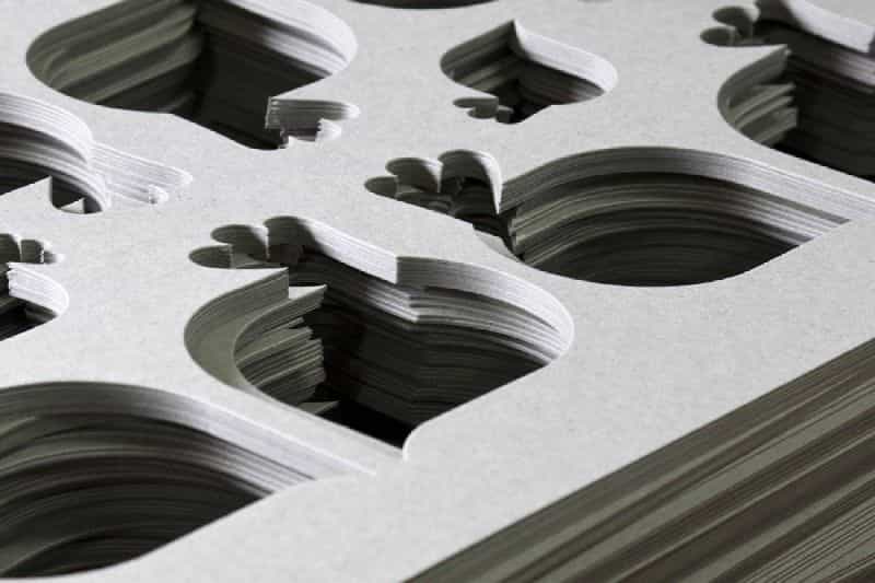 Die-cut packaging box shape and creasing